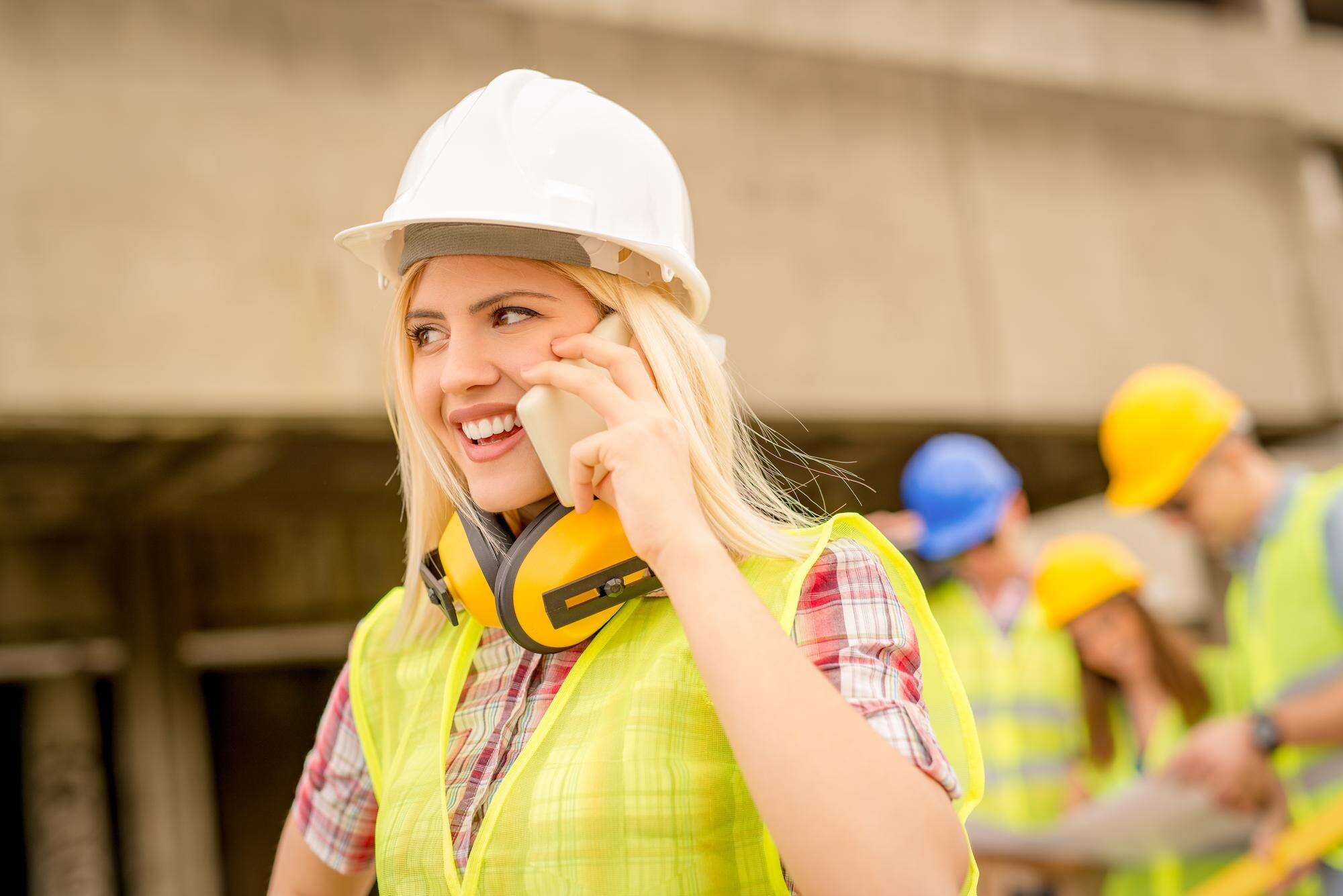 beautiful-young-female-construction-architects-using-phone-construction-site-360066-11755.jpg